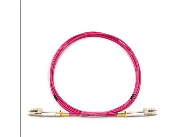 Fiberpatch OM4, LC-LC Dupl, 15meter Halogenfri 3mm, Erika Violet